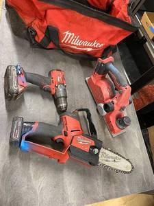 lot 29J image: Milwaukee Power Tool Set Chainsaw, Drill, Planer with Bag - Used