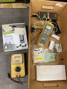 lot 49AD image: Lot of Electronic Testing Devices Including Vintage Battery Tester, Measure Master Laser, and Accessories