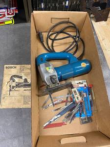 lot 59AD image: Bosch Vintage Jigsaw with Top Handle and Assorted Blades Including Original Manual
