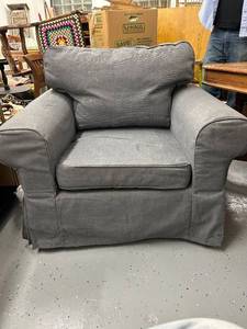 lot 2 image: Upholstered Armchair with Removable Cushion in Gray Fabric