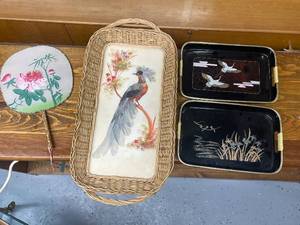 lot 339 image: Asian-Inspired Decor Lot with Fan, Woven Tray, and 2 Metal Trays