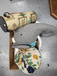 lot 328 image: Crafting and Decor Lot with Elephant Pillow, Knitting Supplies, and Pumpkin Plush