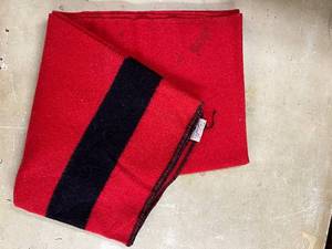 lot 56 image: Faribo 100% Wool Red and Black Fluff-Loomed Blanket, small hole