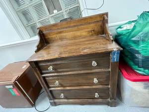lot 122 image: Antique Wooden 3-Drawer Dresser with Glass Pulls and Decorative Backboard