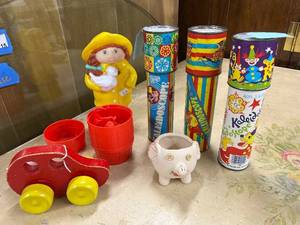 lot 131 image: Vintage Toy Collection Kaleidoscopes, Barrel of Monkeys, Rattly Car, Pig Figurine, and Coin Bank