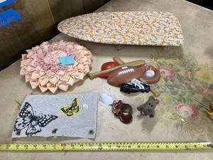 lot 132 image: Assorted Decorative Lot Mini Ironing Board, Sports Decor, Ceramic Bear, and More