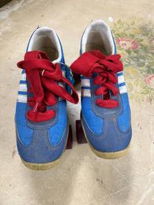 lot 136 image: Vintage Blue Roller Skates with Red Laces