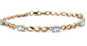 lot 53 image: Oval Natural Aquamarine Oval Flat Link Station Bracelet in Yellow Gold VIDEO