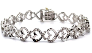 lot 69 image: 0.50 Carat Natural Diamond Open Heart Halo Bracelet VIDEO