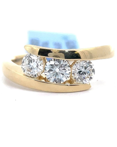 lot 42 image: 2 Carat Diamond Three-Stone Ribbon Bypass Ring in Yellow Gold Retail $1,675
