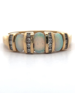 lot 85 image: White Oval Opal & Natural Diamond Channel Estate Ring in 14k Yellow Gold VIDEO