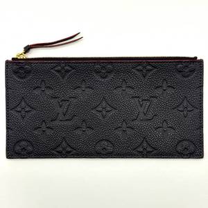 lot 114 image: Louis Vuitton Monogram Empreinte Leather Pochette Pre-Owned Retail $720