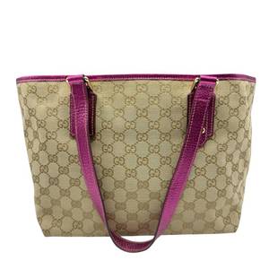 lot 142 image: Gucci GG Canvas Tote Bag with Metallic Pink Leather Trim Pre-Owned Retail $550