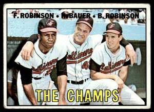lot 68 image: Frank RobinsonHank BauerBrooks Robinson  1967 Topps #1 Baltimore Orioles  Vintage Baseball Card