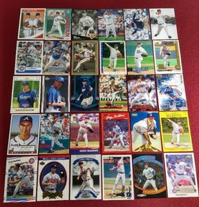 lot 62 image: (30) Greg Maddux Cards
