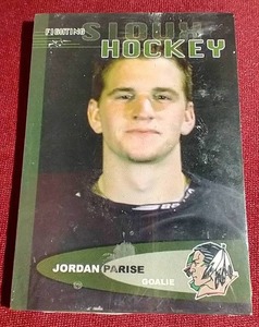 lot 69 image: Unopened 2003-04 UND Fighting Sioux Cards