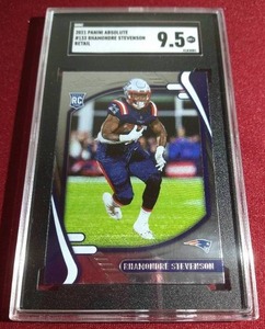 lot 203 image: 2021 Absolute Rhamondre Stevenson Rookie - SGC 9.5