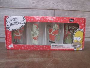 lot 143 image: (K) The Simpsons Christmas Pint Gla...
