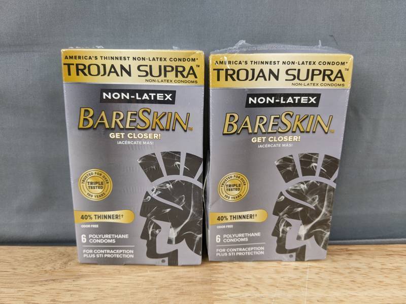lot 49G image: 12 Trojan Supra BareSkin Non-Latex Condoms, 2 Six Packs - Brand New