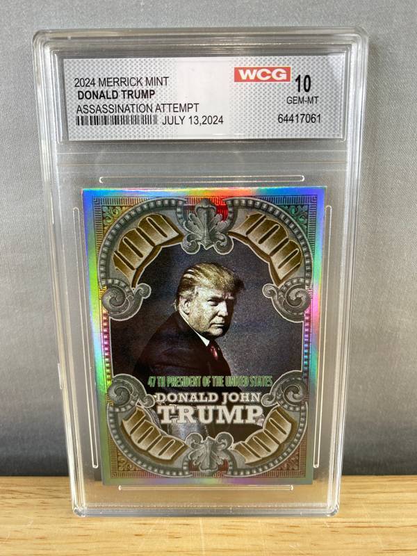 lot 40C image: 2024 Merrick Mint Donald Trump Card Graded WCG 10 GEM-MT