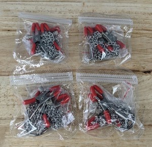 lot 157 image: 4 Body Clamp Clips with Chains - Brand New