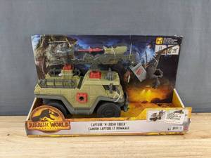 lot 35E image: Jurassic World Capture N Crush Truck - Brand New