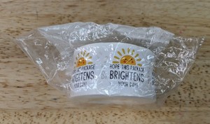 lot 406 image: Roll of 500 Hope This Package Brightens Your Day Stickers - Brand New P