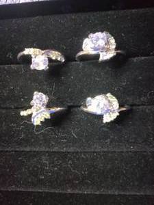 lot 10 image: 4 Stainless Steel Fashion Rings with CZ Stones - Size 7.5 to 7.75