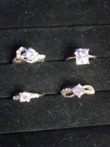 lot 20 image: 4 Stainless Steel Fashion Rings with CZ Stones - Size 5.25 to 5.5