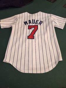 lot 214 image: Joe Mauer Minnesota Twins white pinstripe baseball jersey. - Size Small