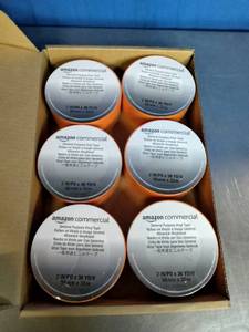 lot 37 image: 6  Rolls of Orange, Self-Adhering Tape.