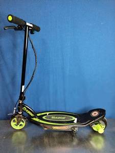 lot 7 image: Razor Power Core E90 electric scooter in black and green.