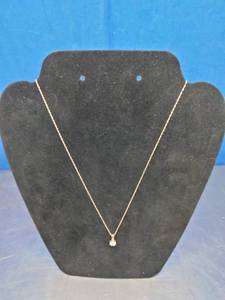 lot 25 image: 10K Yellow Gold Diamond Cluster Pendant Necklace. 16