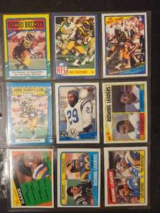 lot 241 image: Collection of vintage NFL football trading cards featuring Hall of Fame running back Eric Dickerson.