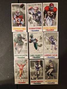 lot 250 image: Collection of vintage NFL Gameday football trading cards featuring various Hall of Fame players.