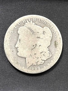 lot 48 image: 1889-O Morgan Silver Dollar