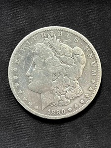 lot 5 image: 1890-CC Morgan Silver Dollar