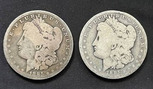 lot 14 image: Pair of 1885-O Morgan Silver Dollars