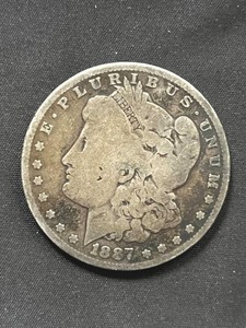 lot 22 image: 1887-O Morgan Silver Dollar