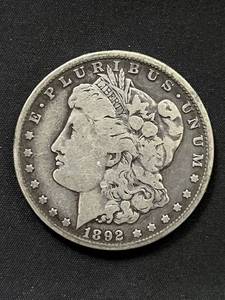 lot 24 image: 1892-O Morgan Silver Dollar