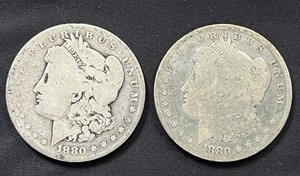 lot 25 image: Pair of 1880 Morgan Silver Dollars