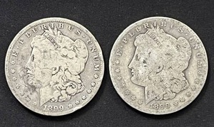 lot 28 image: Pair of 1899-O Morgan Silver Dollars