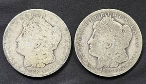 lot 29 image: Pair of 1888-O Morgan Silver Dollars