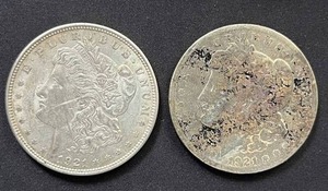 lot 30 image: Pair of 1921 Mogan Silver Dollars