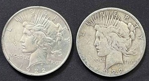 lot 35 image: Pair of 1922 Peace Dollars