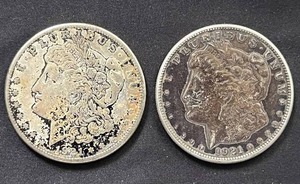 lot 41 image: Pair of 1921 Mogan Silver Dollars