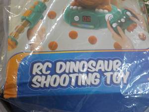 lot 65 image: RC Dinosaur Shooting Toy- damaged b...