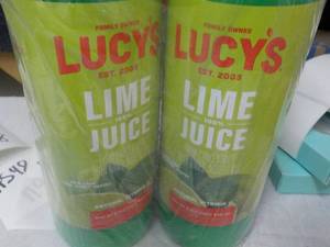 lot 112 image: 2 Bottles 32 oz each Lucys Lime Ju...