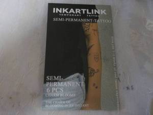 lot 148 image: Inkart Link Temporary Tattoos...