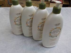 lot 195 image: 4 Lacura 18 oz Bottles Oatmeal Body...